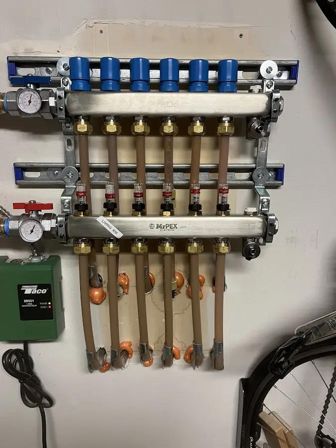 Plumber performing Water Heater Repair at a residential property in Westfield